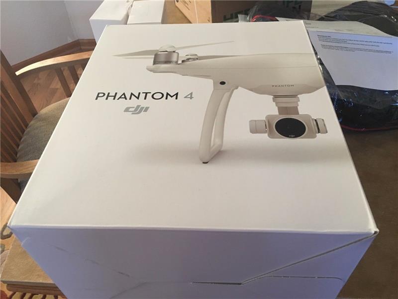 DJI Phantom 4 Quadcopter Drone with 4K Gimbal-Stabilized 12MP Camera