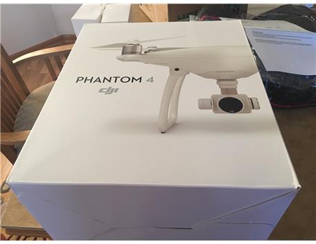 DJI Phantom 4 Quadcopter Drone with 4K Gimbal-Stabilized 12MP Camera