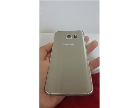 Samsung s6 gold 32gb 3 gb ram her şeyi tam ekranda köşede iz var 