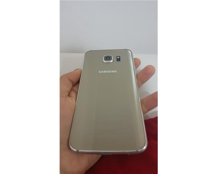 Samsung s6 gold 32gb 3 gb ram her şeyi tam ekranda köşede iz var 